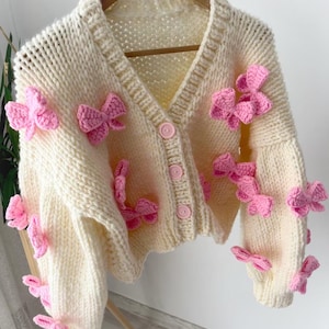 Handmade Cream Knit Cardigan: Chunky Sweater with Pink Crochet Bows